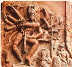 The sixth-century stone sculpture of Dancing Shiva from Badami, Karnataka, carved with multiple arms and dynamic dance poses