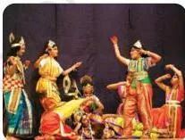 Students performing in different costumes and make-up, showing how a dance form can be identified by its appearance alone
