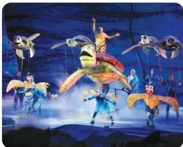Coloured lighting on a stage set establishing the mood of a play before the actors speak, combining colour and light as set design