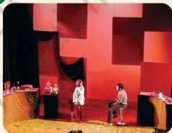 A scene performed by students on stage, the picture used in Exercise Q1 for identifying what each element represents