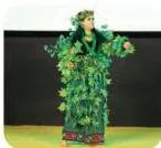 A stage design symbolising the environment, showing how costume and setting can represent nature and its changes on stage