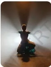 An actor lit from behind so the body becomes a dark silhouette with glowing edges, the backlight effect