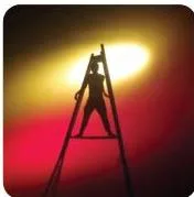 A red PAR and a yellow PC lighting the same stage from different angles, showing how coloured fixtures combine