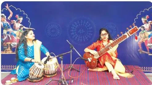 Kala Utsav participants playing the sitar and tabla together, the melody and rhythm instruments that carry rāga and tāla