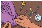 Hands guiding a needle along a marked line while handstitching an apparel laid flat