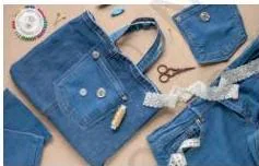 Old denim jeans being turned into a carry bag with fabric, an example of upcycling clothes