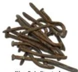 Iron nails covered with a flaky brown layer of rust, the new substance formed when iron reacts with air and water