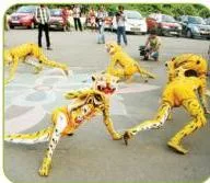 A dancer taking a monkey's strong steps and jumps, an animal gati that replaces lightness with power