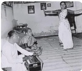 Archival image of Sadir artists singing live while dancing