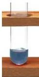 The same test tube after lime water was added drop by drop, the liquid having turned back to blue
