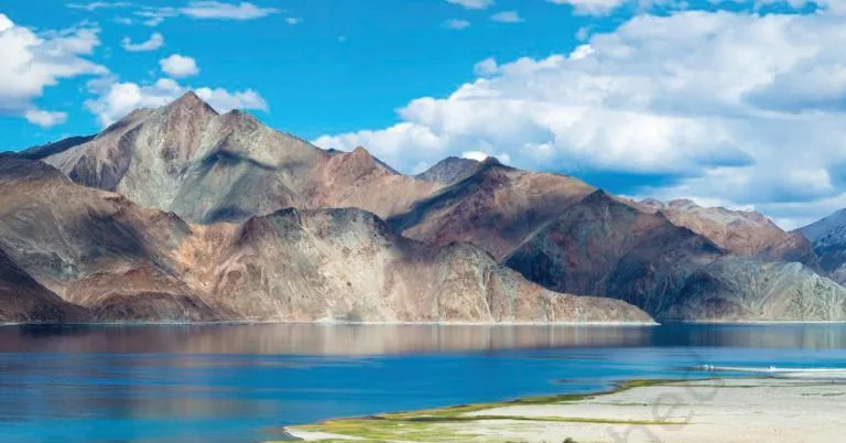 Pangong Tso, Ladakh. This lake has salty water, unlike most other lakes. The saltiness is a result of the minerals that dissolve from the surrounding mountain areas.
