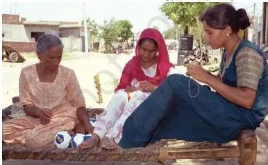 Women at home in Ludhiana making footballs for large MNCs