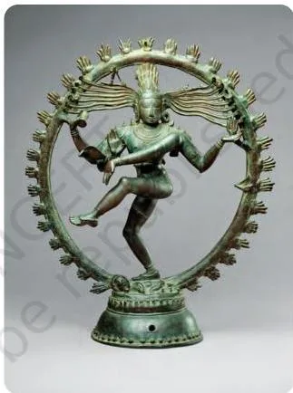Chola bronze of Shiva as Nataraja, lord of dance, posed within a ring of fire with four hands and flying hair