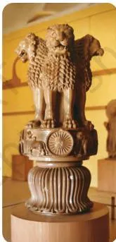 The Sarnath lion capital, four lions seated back to back on a circular abacus, the national emblem of India