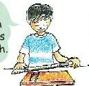 A child measuring the length of the Math-Magic book with centimetre cubes laid in a row