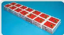 Fourteen matchboxes arranged in one layer on the floor, the first layer of Tanu's stage