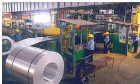 Photograph of the strip mill inside the NALCO aluminium smelter, showing the industrial scale at which bauxite is converted into aluminium metal