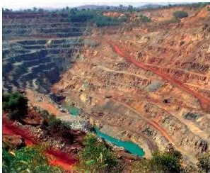 Photograph of an iron ore mine showing a working site where the hematite ores of the four belts are extracted