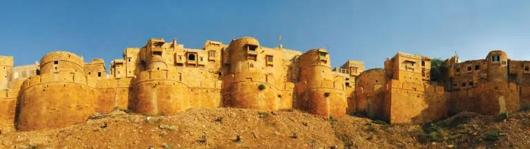 Jaisalmer fort in Rajasthan, a 12th-century mud structure later refurbished with sandstone, showing the durability of earth construction