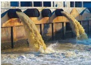 Industrial waste being released into a water body without treatment, breaking nature’s cycle and harming the river