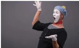 A performer using imagination along with body language and expressions to draw the audience into an invisible world