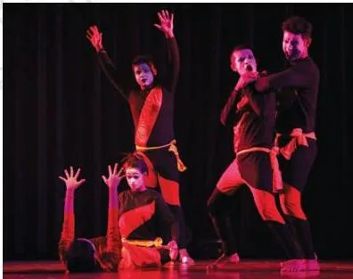 A mime performer expressing feelings on stage, showing how mime lets people share without fear of being judged