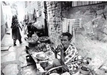 Photograph illustrating the section on protecting unorganised-sector workers, who often face low and irregular pay along with social discrimination
