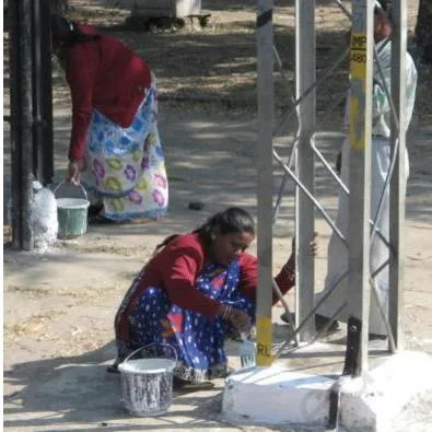 Photograph printed beside the passage explaining that some employment suggestions take a long time to implement, which is why quick measures like the Right to Work law were also needed