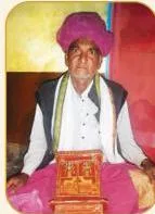 Illustration of Kaavadiya Khojaram ji beside the caption placing him in Kumar Dhani near Jodhpur, Rajasthan, a practitioner of over 40 years.