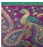 A textile motif representing truth, knowledge and love, drawn in a repeating decorative style