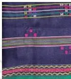A textile motif representing wholeness and one’s energy, drawn in a repeating decorative style