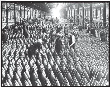 Workers manufacturing munitions in a factory during the First World War, with production reorganised for war needs
