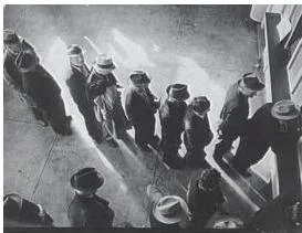 A long queue of unemployed people lining up for benefits in the United States during the Great Depression, photographed by Dorothea Lange in 1938