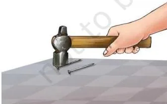 Beating an iron nail with a hammer
