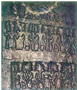 'Pañcha Pāṇḍavar', a carved stone in a forest of the Nilgiris, Tamil Nadu, depicting the five Pāṇḍava brothers. The shrine containing this stone is maintained by Irula tribals to commemorate the Pāṇḍavas' passing through the area.