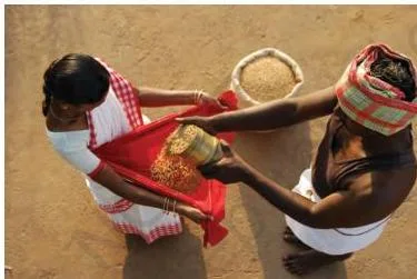 Women often put the sari to many uses beyond that of a dress (pictures from south India).