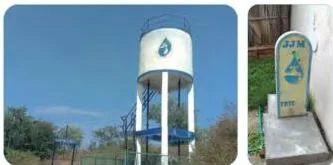 A large overhead water storage tank on a building with taps below it, showing how a community stores water and supplies it to households