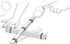 Steps for making a catapult using ice cream sticks and spoon