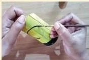 A series of step drawings for making a bamboo product — sketch, measure, cut internodes, smooth, assemble, sand and varnish
